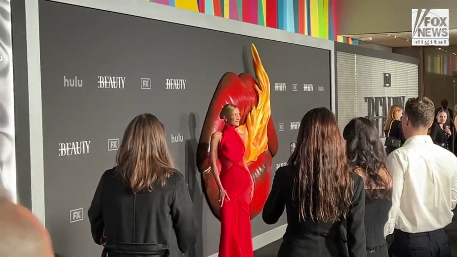 Bella Hadid turns heads in daring red sheer gown at FX’s ‘The Beauty’ New York premiere