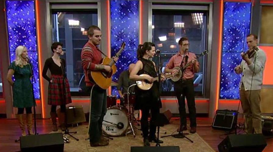 Gospel folk band performs 'Angels We Have Heard on High'