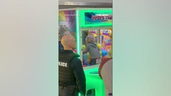 Toddler CLIMBS INTO CLAW MACHINE