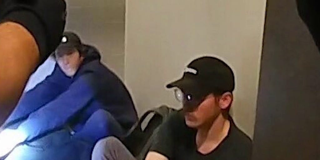 Citizen calls 911 after spotting men atop iconic Nashville building