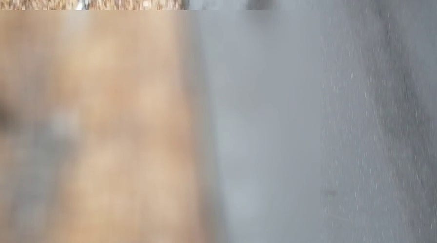 Aerial footage of Akron, Ohio crime scene, where homicide victims were found bound and gagged