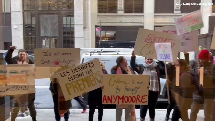 Celine Dion fans protest outside the Rolling Stone offices after they leave her out of 200 best singers list
