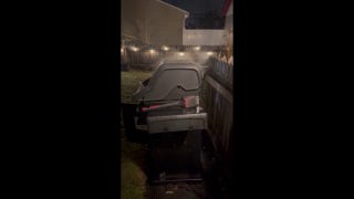 Ohio resident grills meal outside during stormy weather - Fox News