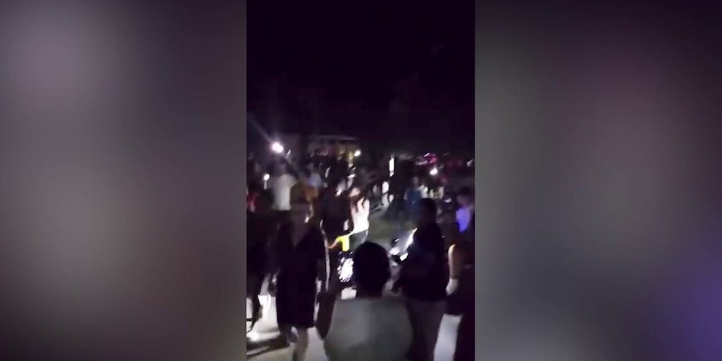 Crowds march through streets during anti-government protests in Cuba