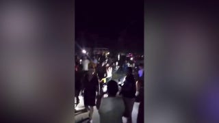 Crowds march through streets during anti-government protests in Cuba