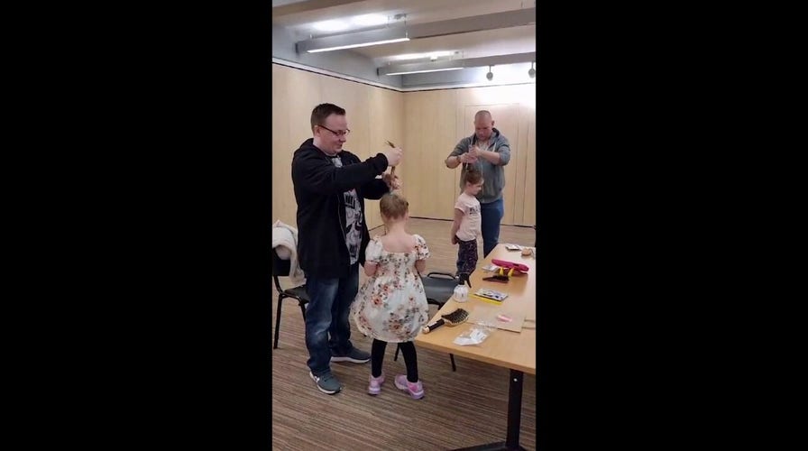 Dads learn how to do their daughters' hair thanks to local hairstylist and mom of two
