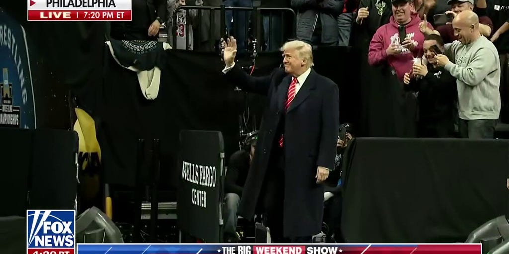 President Trump welcomed by audience chanting 'USA!' at NCAA wrestling championship