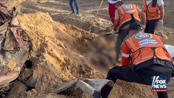 'MASS GRAVE': Paramedics from Palestine Red Crescent recover bodies of colleagues in Southern Gaza