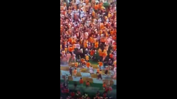 Video shows Jermaine Burton striking a female Tennessee fan who stormed the field