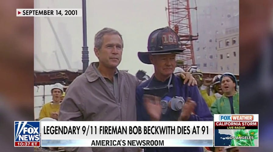 9/11 firefighter who stood with President George W. Bush dies at 91.