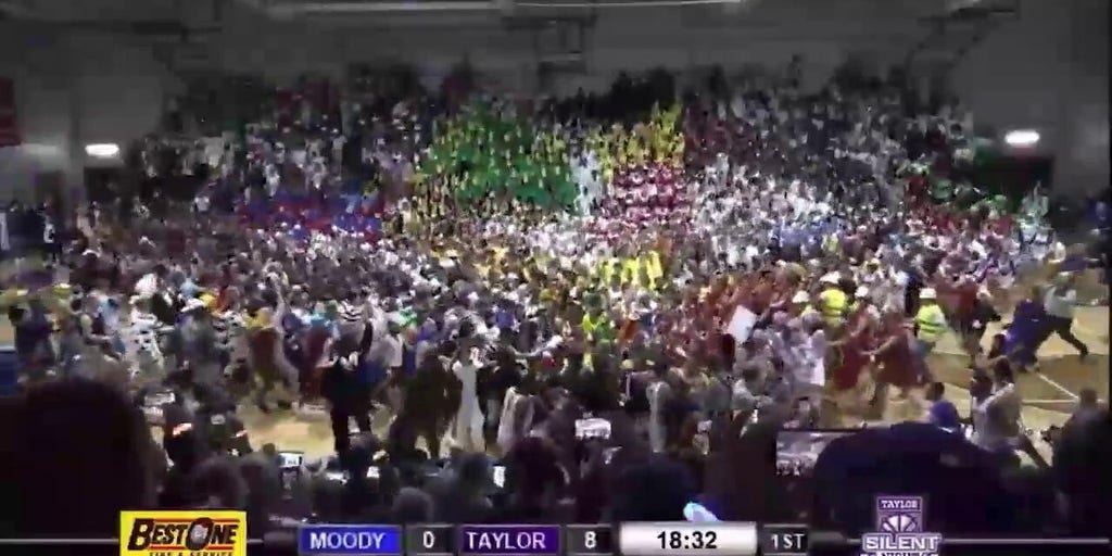 Taylor University basketball fans storm the court for ‘Silent Night’ game tradition