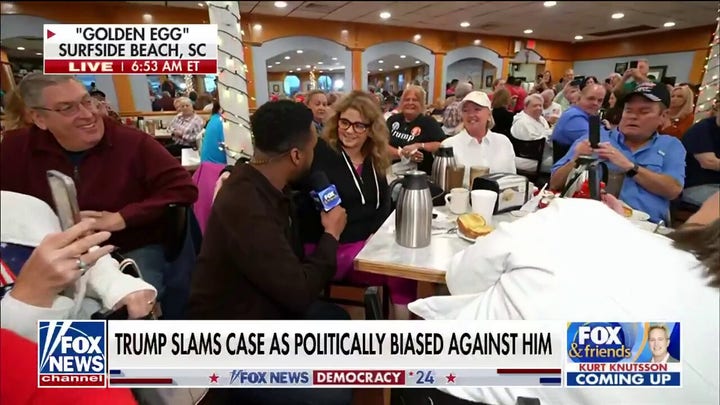 Lawrence Jones talks with South Carolina voters ahead of GOP primary