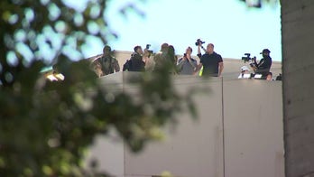 Noem visits Portland ICE facility, prays over staff