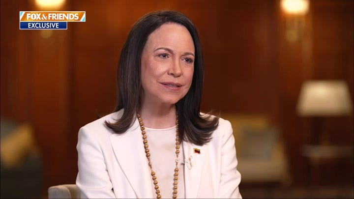 Venezuelan opposition leader says she presented her Nobel Peace Prize to President Donald Trump on behalf of Venezuelans