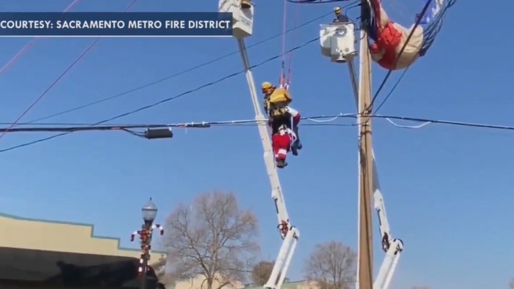 Paragliding Santa in California rescued after getting entangled in powerlines