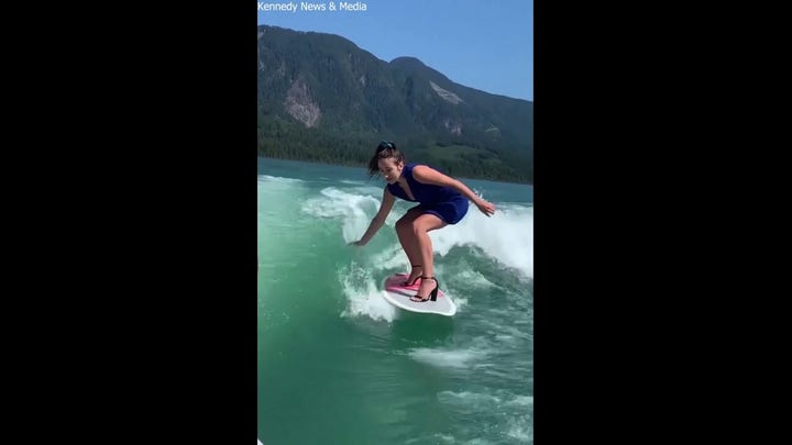 Wakesurfing in high heels