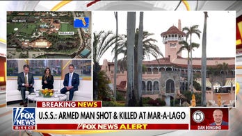 Armed suspect shot and killed at Mar-a-Lago, Secret Service says