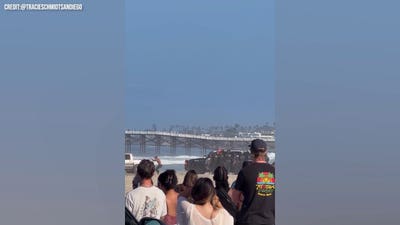 WATCH: Suspected DUI driver raises hands as police move in after wild beach chase