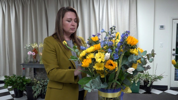A Ukrainian florist who lives in Charlotte is helping refugees from afar