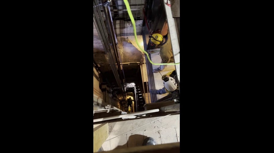 Video shows first responders using makeshift pulley system to hoist stranded tourists 200 feet out of elevator shaft