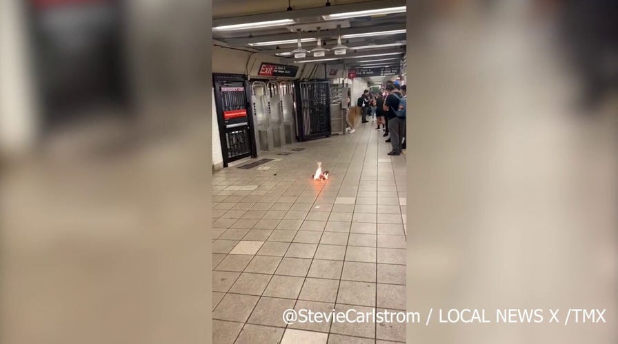 Man in NYC subway lights newspapers on fire, throws at school children