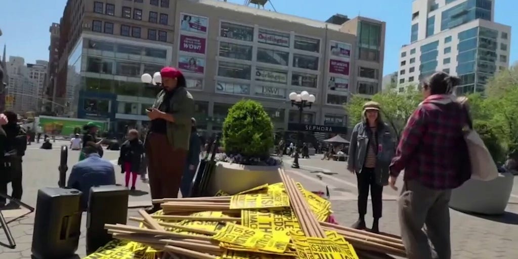 Far-left group stacked signs to hand out at May Day protest as 600 organizations, $2B prop-up demonstrations