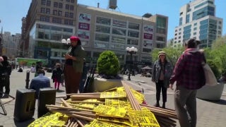 Far-left group stacked signs to hand out at May Day protest as 600 organizations, $2B prop-up demonstrations
