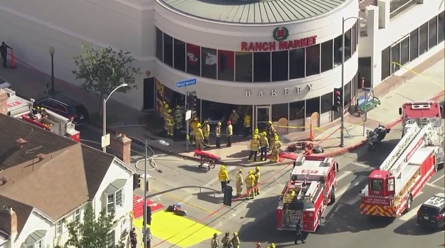 LA emergency crew respond to vehicle crash into grocery store
