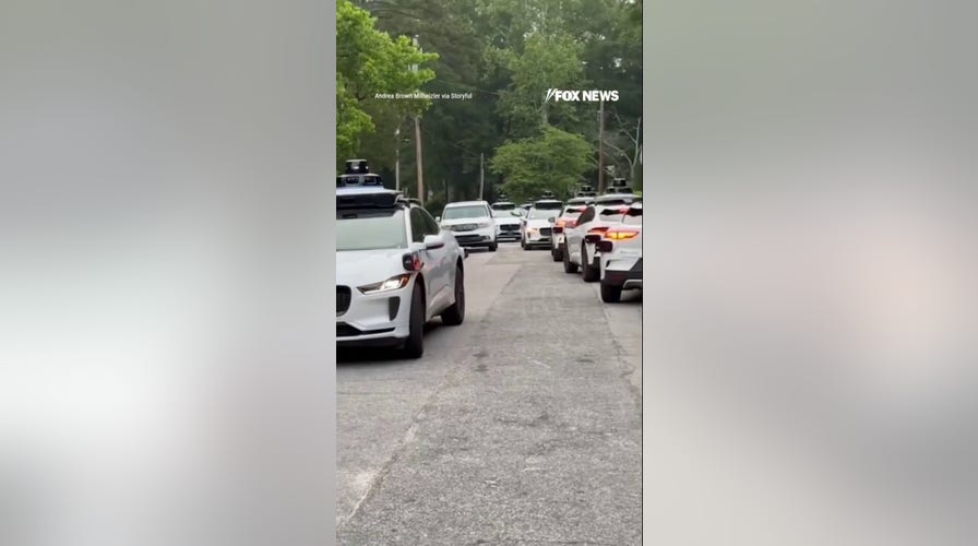 Empty Waymo cars SWARM neighborhood, residents stunned