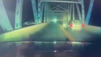 Suspect jumps headfirst off bridge in dramatic attempt to evade deputies