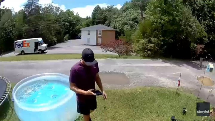FedEx driver takes unexpected dip in Georgia pool after delivery photo mishap
