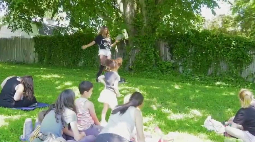 Maryland suburb's library hosts interactive drag queen story time