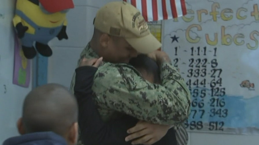 Sailor surprises sister at school after returning home from deployment