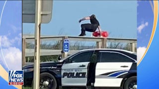 Florida police officer jumps out of squad car to rescue swimmers - Fox News