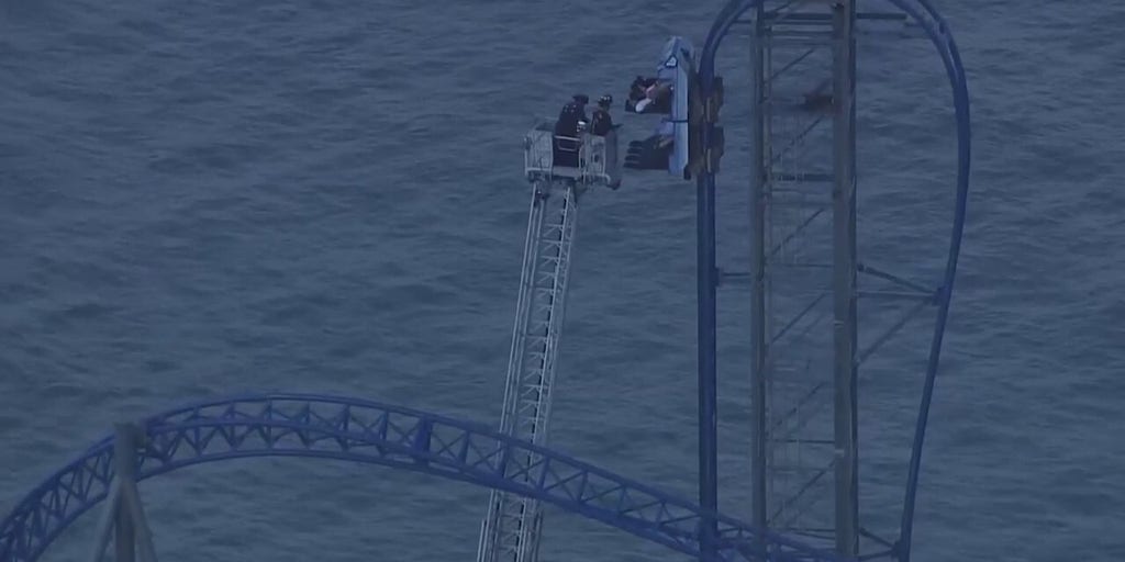 Roller coaster riders rescued after being stranded more than 3 hours above Texas amusement park