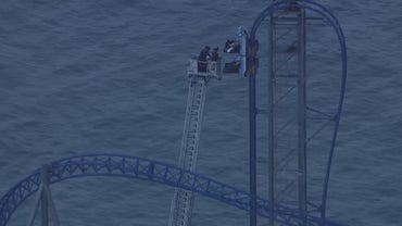Roller coaster riders rescued after being stranded more than 3 hours above Texas amusement park