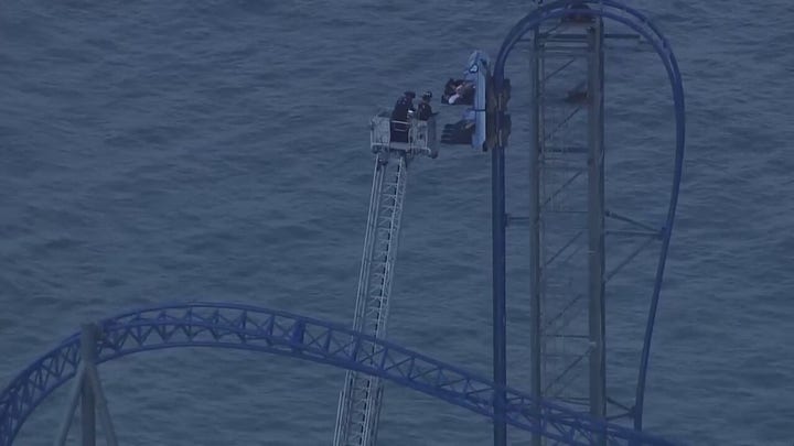 Roller coaster riders rescued after being stranded more than 3 hours above Texas amusement park
