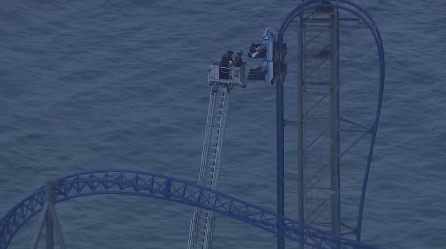 Roller coaster riders rescued after being stranded more than 3 hours above Texas amusement park