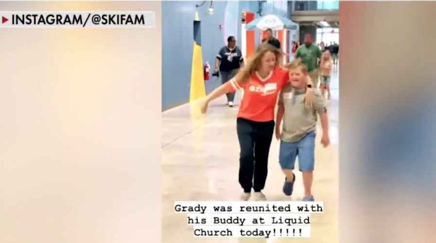 Heartwarming video captures 11-year-old boy reuniting with church buddy 