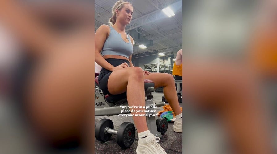 Saucy babe flashes boobs at shocked men during gym workout - Daily