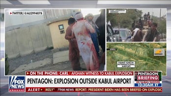 Afghan witness to Kabul airport explosion says young girl died in his arms