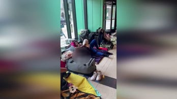 Migrants seen at Chicago police station