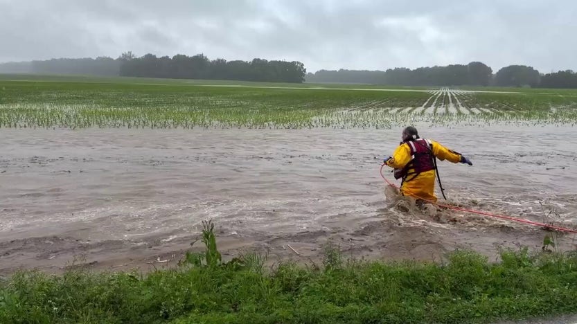 Fire captain rescues baby deer swept away during Indiana flood response