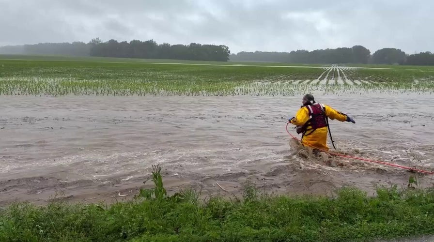 Fire captain rescues baby deer swept away during Indiana flood response