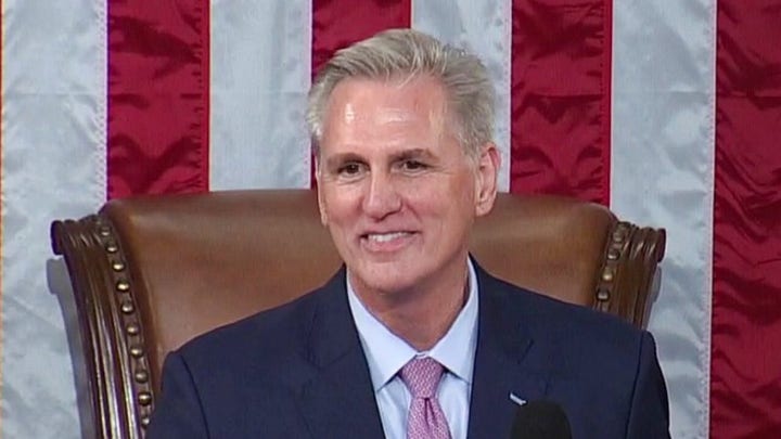 House Minority Leader Hakeem Jeffries hands speaker's gavel to Speaker-elect Kevin McCarthy