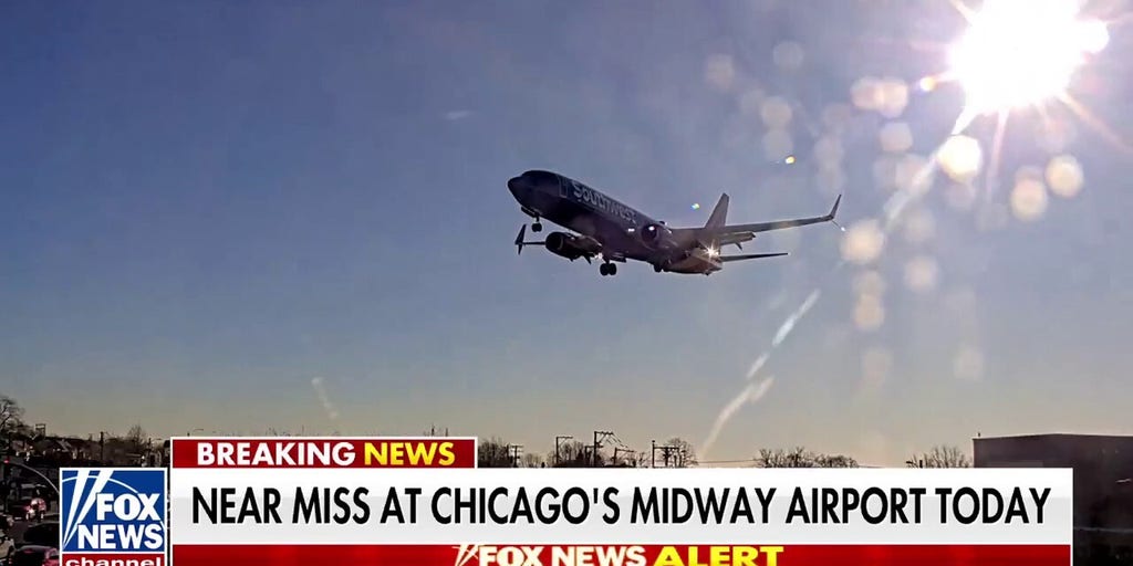 Southwest jet nearly collides with private plane on Chicago runway