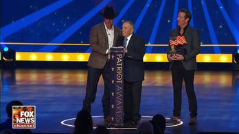 Dennis Quaid presents WWII veteran Sgt. Andy Negra with 'Salute to Service' award at Fox Nation’s Patriot Awards