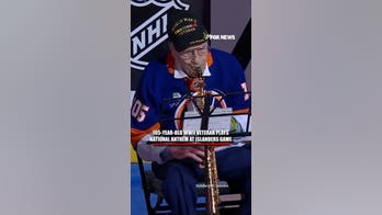 105-year-old WWII veteran plays national anthem at Islanders game