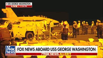 Guided-missile destroyers defend USS George Washington in Middle East