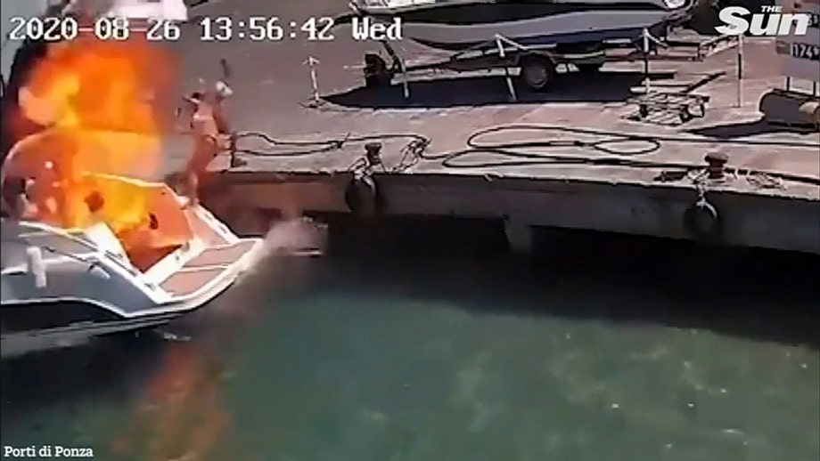 Boat explosion in Italian port sends woman flying through air, video shows